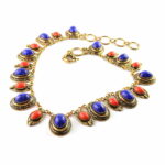 Antique gold treated brass & copper alloy necklace with glass cabochon stones.
