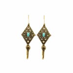 Hypoallergenic gold treated bronze earrings with glass paste cabochon stone.