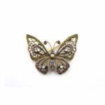 Brooch in hypoallergenic bronze treated with gold with micro-pearl and SWAROVSKI crystals