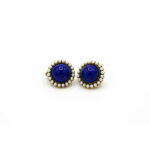 Antique gold treated brass / copper alloy earrings. 12 mm cabochon in lapis color glass paste, cultured microbeads. Clip frame.