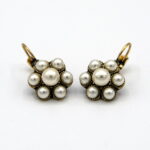 Antique gold treated brass / copper alloy earring with white pearls.